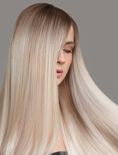 long silky hair with blended highlights giving a polished look